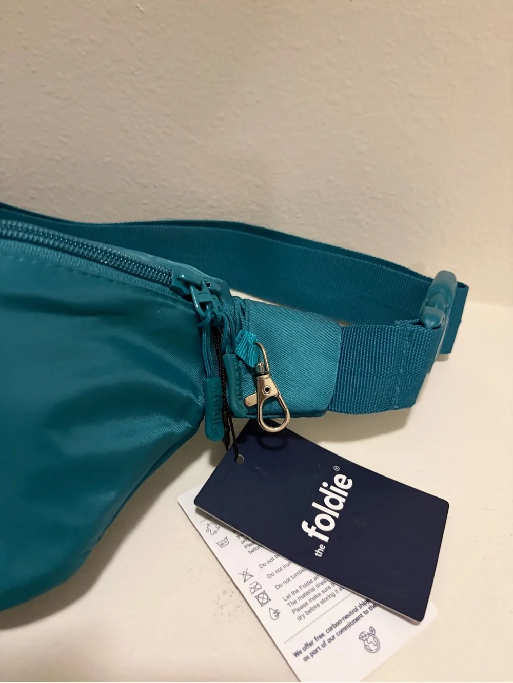 The Foldie Teal Waist Crossbody Bag RFID Blocking Travel Hand Free NWT